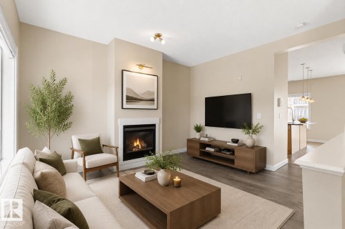 #39 13825 155 Av Nw, Edmonton, AB - Indoor Photo Showing Living Room With Fireplace