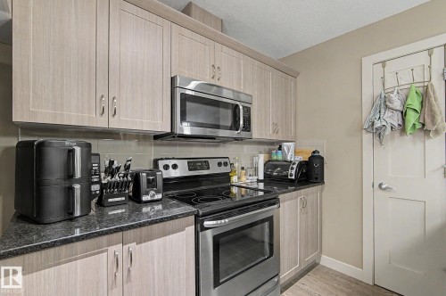 #77 1776 Cunningham Wy Sw, Edmonton, AB - Indoor Photo Showing Kitchen
