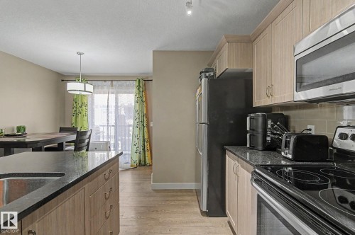 #77 1776 Cunningham Wy Sw, Edmonton, AB - Indoor Photo Showing Kitchen