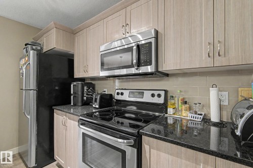 #77 1776 Cunningham Wy Sw, Edmonton, AB - Indoor Photo Showing Kitchen