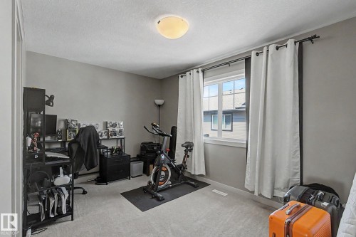 #77 1776 Cunningham Wy Sw, Edmonton, AB - Indoor Photo Showing Gym Room