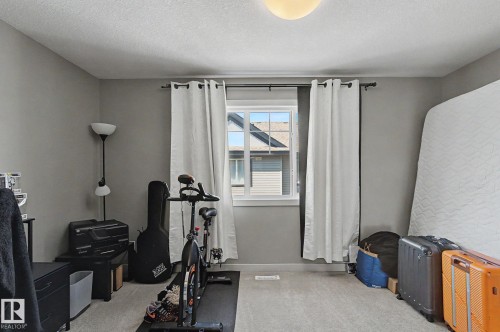 #77 1776 Cunningham Wy Sw, Edmonton, AB - Indoor Photo Showing Gym Room
