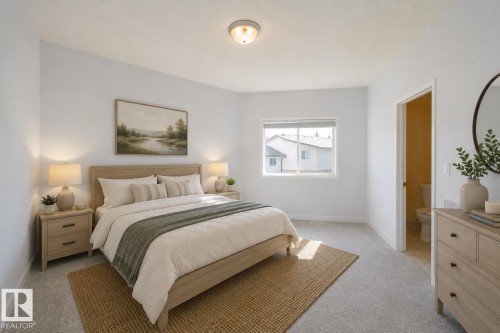 Light gray wall paint, recessed window, light wood-finish flooring, light gray carpet, interior door - #37 3811 85 St Nw, Edmonton, AB 