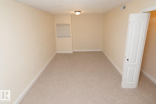 Neutral-toned carpeting throughout - #37 3811 85 St Nw, Edmonton, AB 