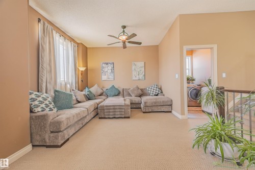Large bonus room with ample natural light and 9 FT ceiling - 57 Homestead Crescent Nw, Edmonton, AB 