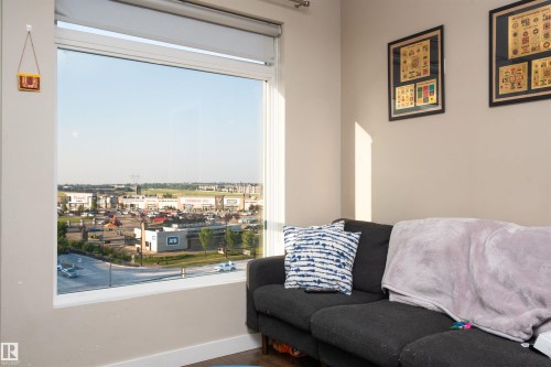 Expansive picture window offering broad exterior views - #610 5151 Windermere Bv Sw, Edmonton, AB - Indoor