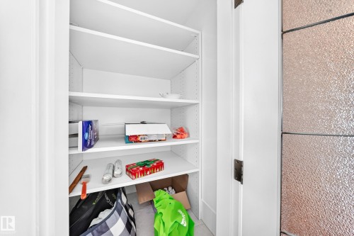 White built-in shelving with adjustable shelves - 3311 104 Avenue Nw, Edmonton, AB 