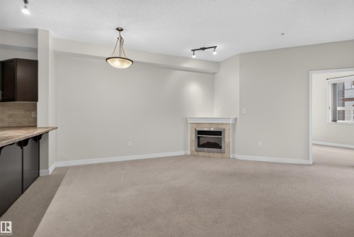 #212 2035 Grantham Ct Nw, Edmonton, AB - Indoor With Fireplace