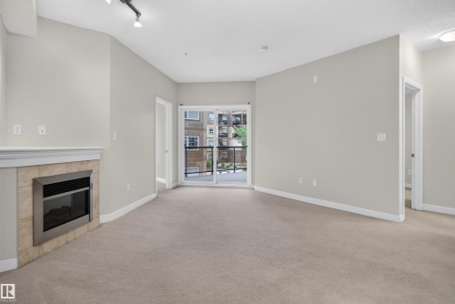#212 2035 Grantham Ct Nw, Edmonton, AB - Indoor With Fireplace