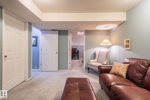 Recessed ceiling, neutral wall paint, white paneled doors, and carpeted flooring - 8 Edgemont Point(E), St. Albert, AB 