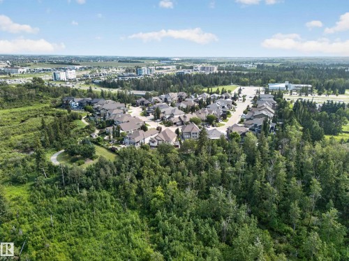 Expansive residential community surrounded by mature trees - #59 10550 Ellerslie Rd Sw, Edmonton, AB - Outdoor With View