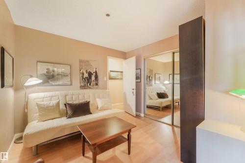 Wood-finish flooring with a neutral wall palette - #203 10171 119 St Nw, Edmonton, AB 