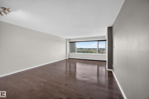 Large Living Room/Dining Room space with stunning south facing views of the River Valley and Victoria Golf Course. - #803 10011 123 St Nw, Edmonton, AB 
