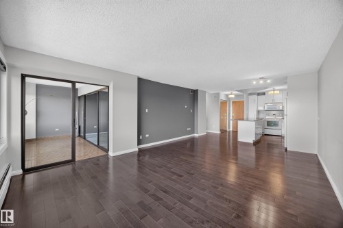 Large Living Room/Dining Room space with stunning south facing views of the River Valley and Victoria Golf Course. - #803 10011 123 St Nw, Edmonton, AB 