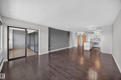 Large Living Room/Dining Room space with stunning south facing views of the River Valley and Victoria Golf Course. - 
