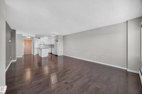 Large Living Room/Dining Room space with stunning south facing views of the River Valley and Victoria Golf Course. - #803 10011 123 St Nw, Edmonton, AB 
