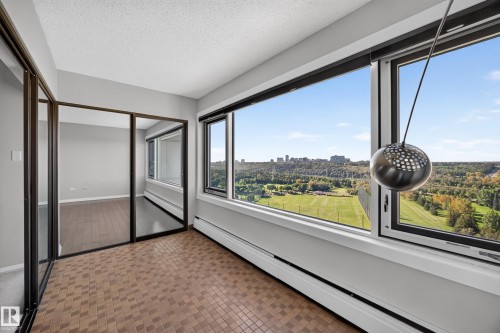 Flex space separated from the Living Room and Bedroom by glass sliding doors. Home office, library, or simply a stunning place to unwind. - #803 10011 123 St Nw, Edmonton, AB 