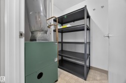 Storage and Furnace Room featuring shelving. - 