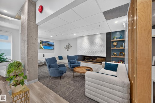 Condo Building Social Room Space featuring Kitchen, Dining Room Space, Multiple Lounge Spaces, two Bathrooms, and access to outdoor common space. - #803 10011 123 St Nw, Edmonton, AB 