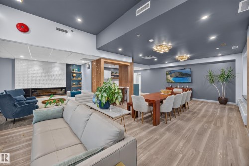 Condo Building Social Room Space featuring Kitchen, Dining Room Space, Multiple Lounge Spaces, two Bathrooms, and access to outdoor common space. - #803 10011 123 St Nw, Edmonton, AB 
