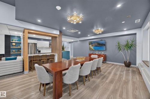 Condo Building Social Room Space featuring Kitchen, Dining Room Space, Multiple Lounge Spaces, two Bathrooms, and access to outdoor common space. - #803 10011 123 St Nw, Edmonton, AB 
