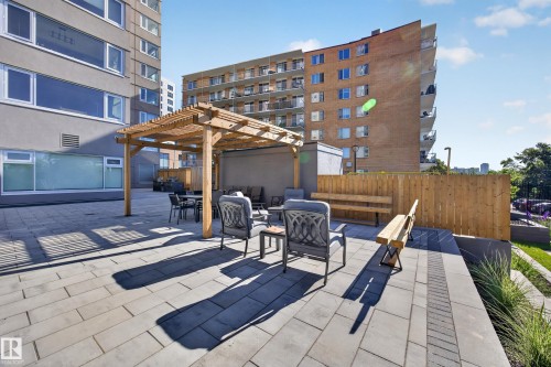 Condo Building Outdoor Common Space featuring Resident BBQ Area, Gazebo, Sitting Areas, Beautiful Landscaping, and Stunning River Valley views. - #803 10011 123 St Nw, Edmonton, AB 