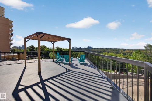 Condo Building Outdoor Common Space featuring Resident BBQ Area, Gazebo, Sitting Areas, Beautiful Landscaping, and Stunning River Valley views. - #803 10011 123 St Nw, Edmonton, AB 