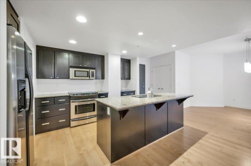 #503 10028 119 St Nw, Edmonton, AB - Indoor Photo Showing Kitchen With Double Sink With Upgraded Kitchen