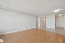 Wood-finish flooring with a tiled entryway - 