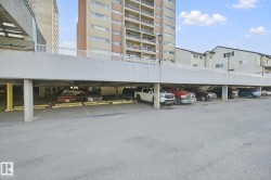 Paved parking lot with designated parking spaces - 