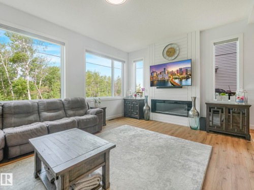 86 Miller Wynd, Leduc, AB - Indoor Photo Showing Living Room With Fireplace