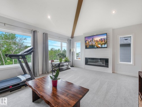 86 Miller Wynd, Leduc, AB - Indoor Photo Showing Living Room With Fireplace