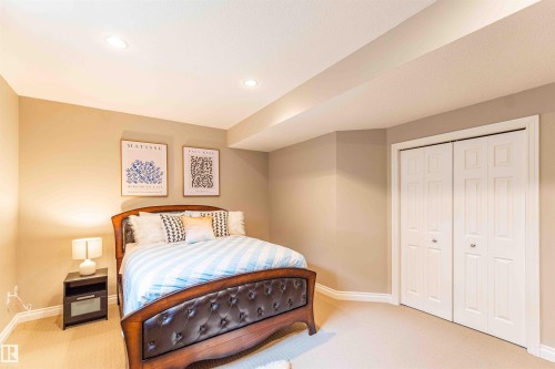 Recessed ceiling lighting, neutral-toned walls, and carpet flooring - 5092 Thibault Way Nw, Edmonton, AB 