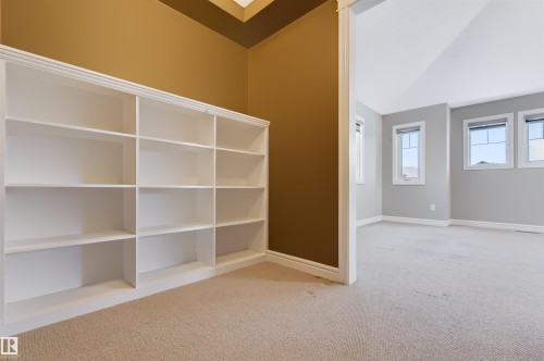 Built-in shelving unit with crown molding - 1420 158 Street Sw, Edmonton, AB 
