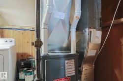 Forced-air furnace system with associated ductwork and PVC piping - 