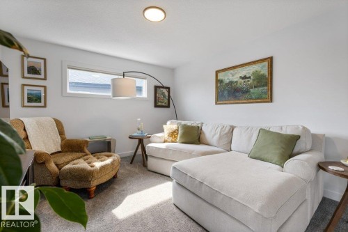Recessed ceiling lighting, light gray wall paint, and gray carpeting - 34 Raspberry Road, St. Albert, AB 
