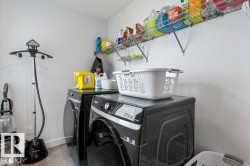 Recessed wall shelving and wire racks provide storage - 