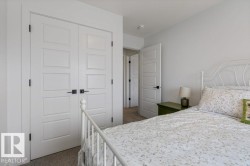 White paneled doors with black hardware - 