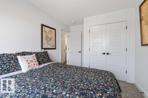 White interior doors with black hardware - 34 Raspberry Road, St. Albert, AB 