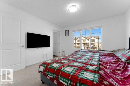1183 Aster Boulevard Nw, Edmonton, AB - Indoor Photo Showing Bedroom