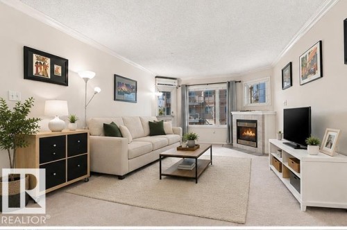 Virtually Staged to show buyers optimal furniture placement - #309 13450 114 Av Nw, Edmonton, AB 