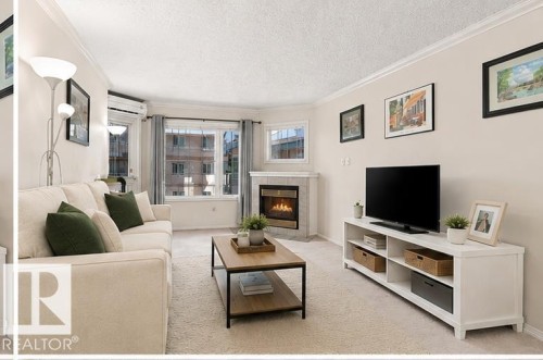 Virtually Staged to show buyer optimal furniture placement - #309 13450 114 Av Nw, Edmonton, AB 
