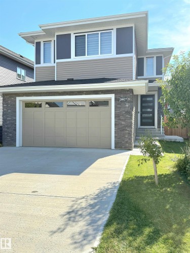 Contemporary exterior with mixed siding and stone accents - 20827 130 Avenue Nw, Edmonton, AB 