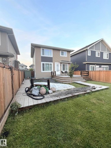 Multi-level decking with exterior access - 20827 130 Avenue Nw, Edmonton, AB 