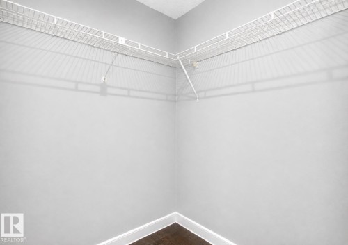White wire shelving system - #203 2624 Mill Woods Rd E Nw, Edmonton, AB 