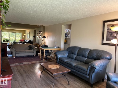 Wood-finish flooring throughout - #112 4404 122 St Nw, Edmonton, AB 