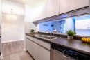 #237 10636 120 St Nw, Edmonton, AB  - Indoor Photo Showing Kitchen With Double Sink 