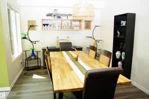 Wood-finish flooring, white walls, and a multi-pane window - 25 Hasen Close, St. Albert, AB 