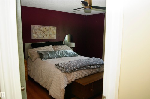 Wood-finish flooring with a ceiling fan and overhead lighting - 25 Hasen Close, St. Albert, AB 