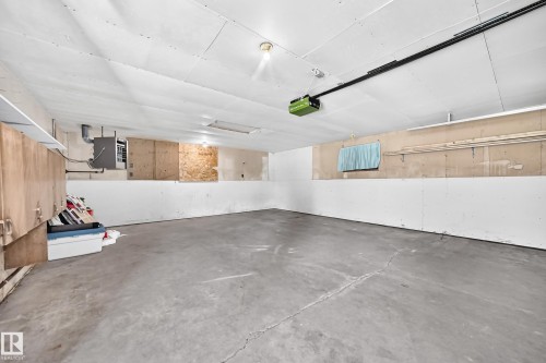 Expansive unfinished basement featuring a concrete floor, exposed ceiling, and integrated lighting - 3 Grantham Place, St. Albert, AB 